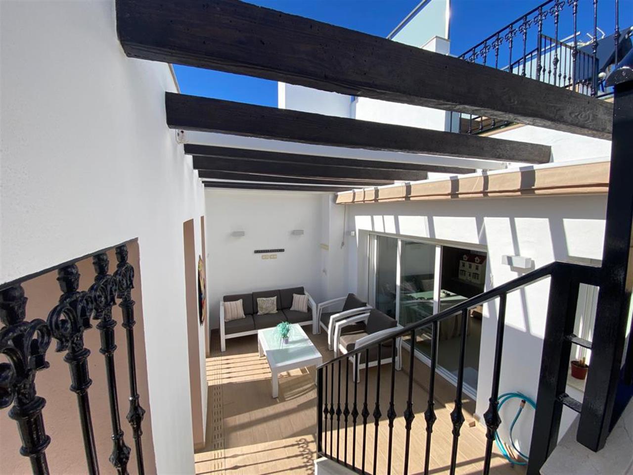 Adosada en venta en Estepona 20